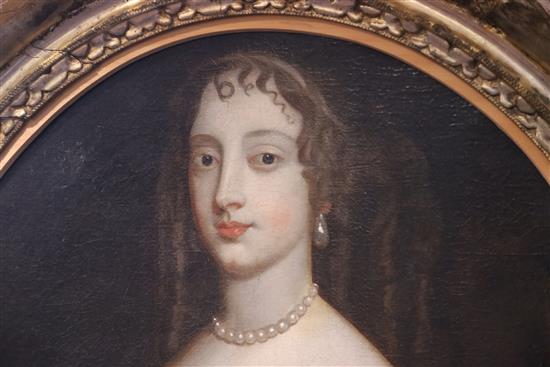 Manner of Sir Peter Lely (1618-1680) Portrait of a lady wearing a pearl necklace and silk dress oval, 28 x 24in.